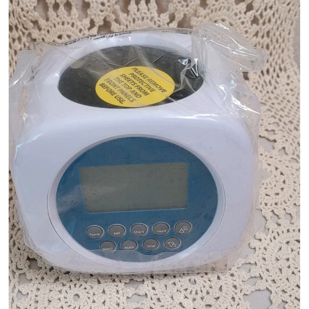 Discovery Projection Alarm Clock Sound Machine. 6 Nature & 4 Alarm Sounds. Stars